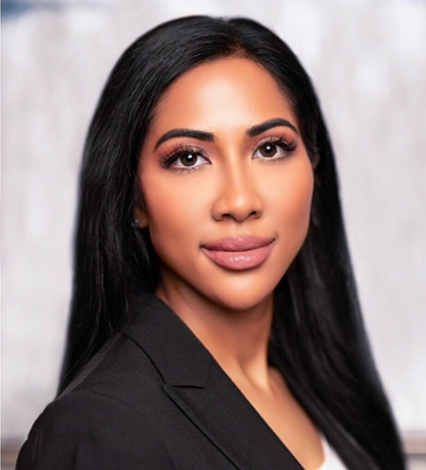 A corporate headshot of attorney Natasha Gill